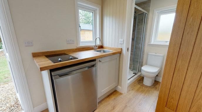 Bespoke Garden Annexes: Plumbing, Toilets, and Small Kitchen Layouts